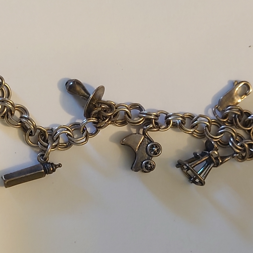 Antique charm bracelet with Gerber baby charms